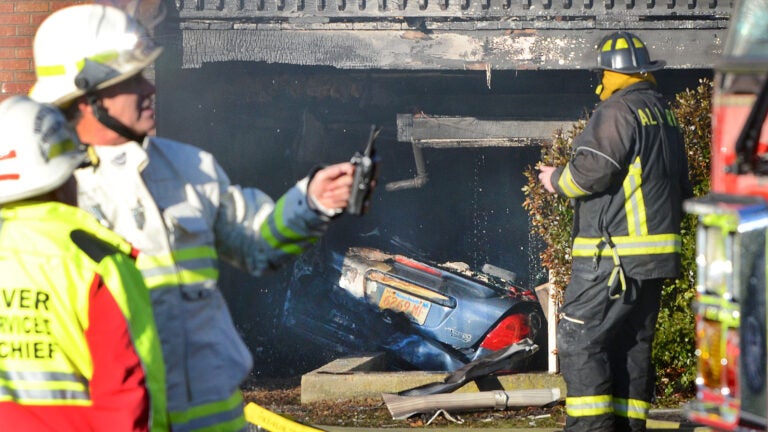 Woman dies after crashing car into Fall River apartments