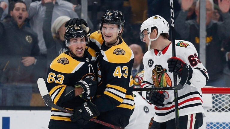 Brad Marchand Danton Heinen Bruins