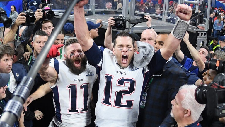 NO FILM, NO VIDEO, NO TV, NO DOCUMENTARY - Super Bowl LIII winning  quarterback Tom Brady of the New England Patriots celebrates with Mickey  Mouse in the Super Bowl victory parade in