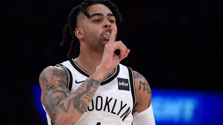 D'Angelo Russell, surging Nets eliminate LeBron James, Lakers from playoff  picture