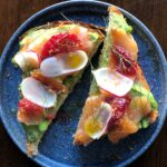 Avocado toast with cured salmon blood orange and radish at Café Beatrice