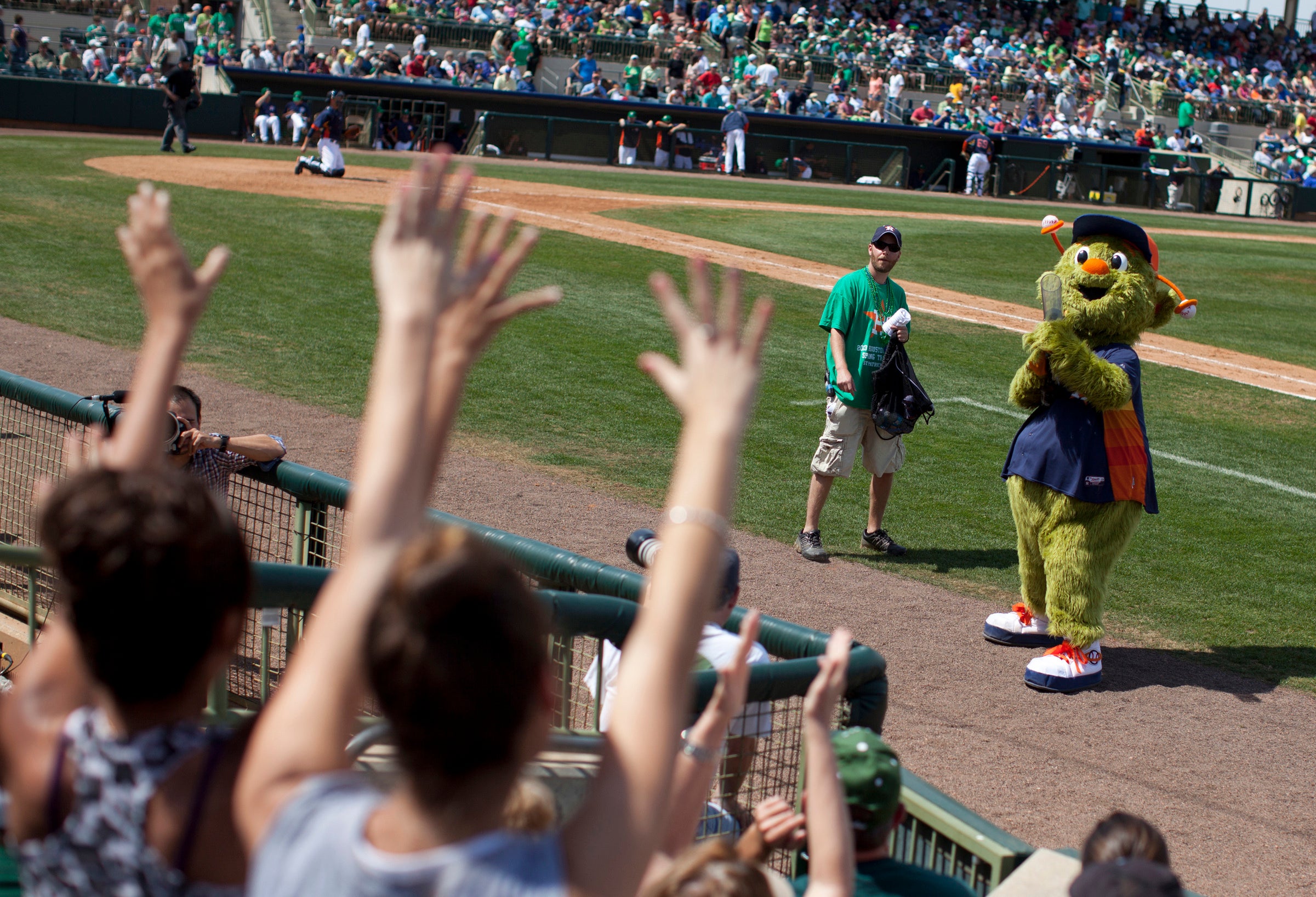 Astros fan sues for $1M, claims mascot's T-shirt cannon broke her