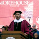 Billionaire technology investor and philanthropist Robert F. Smith announces he will provide grants to wipe out the student debt of the entire 2019 graduating class at Morehouse College in Atlanta, Sunday, May 19, 2019.