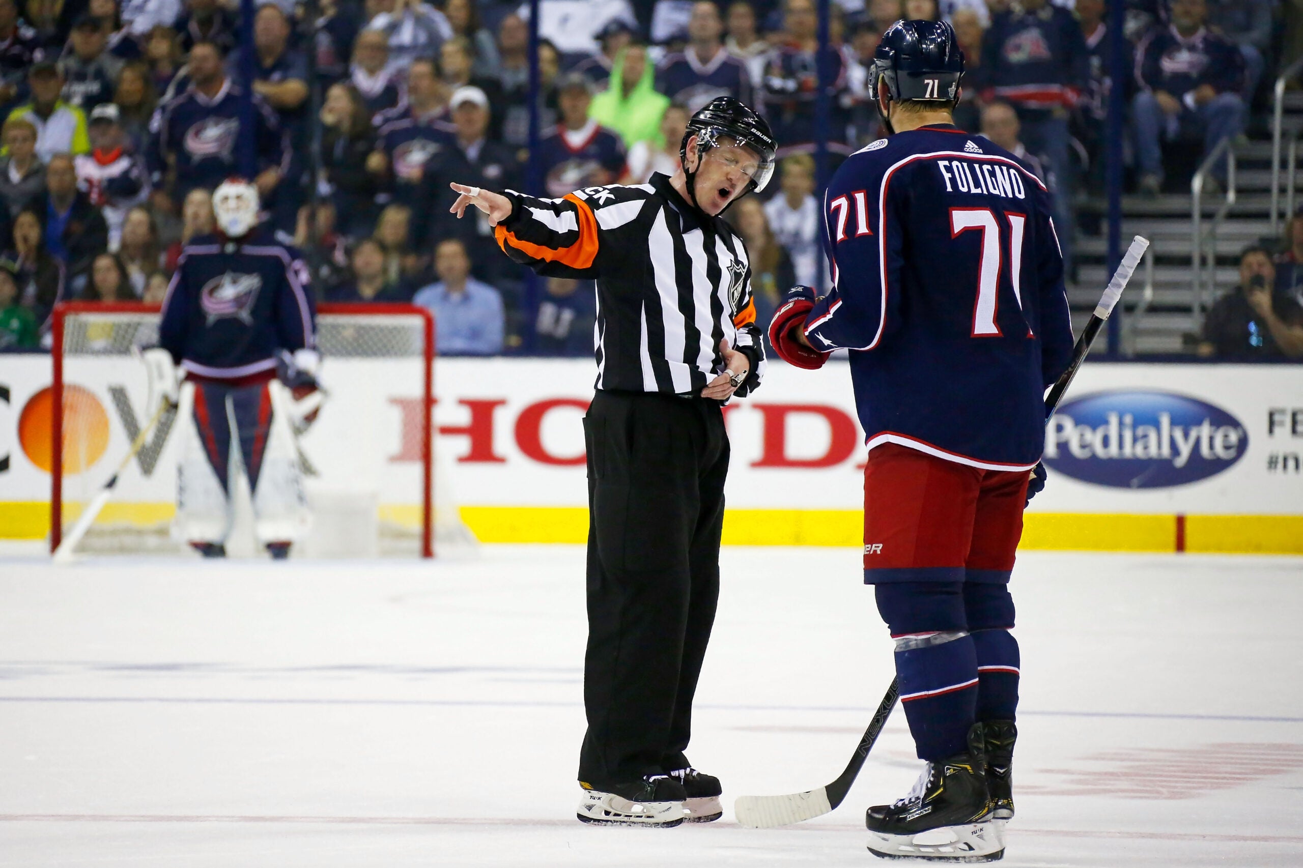 Referee banned from working NHL games after being caught on live