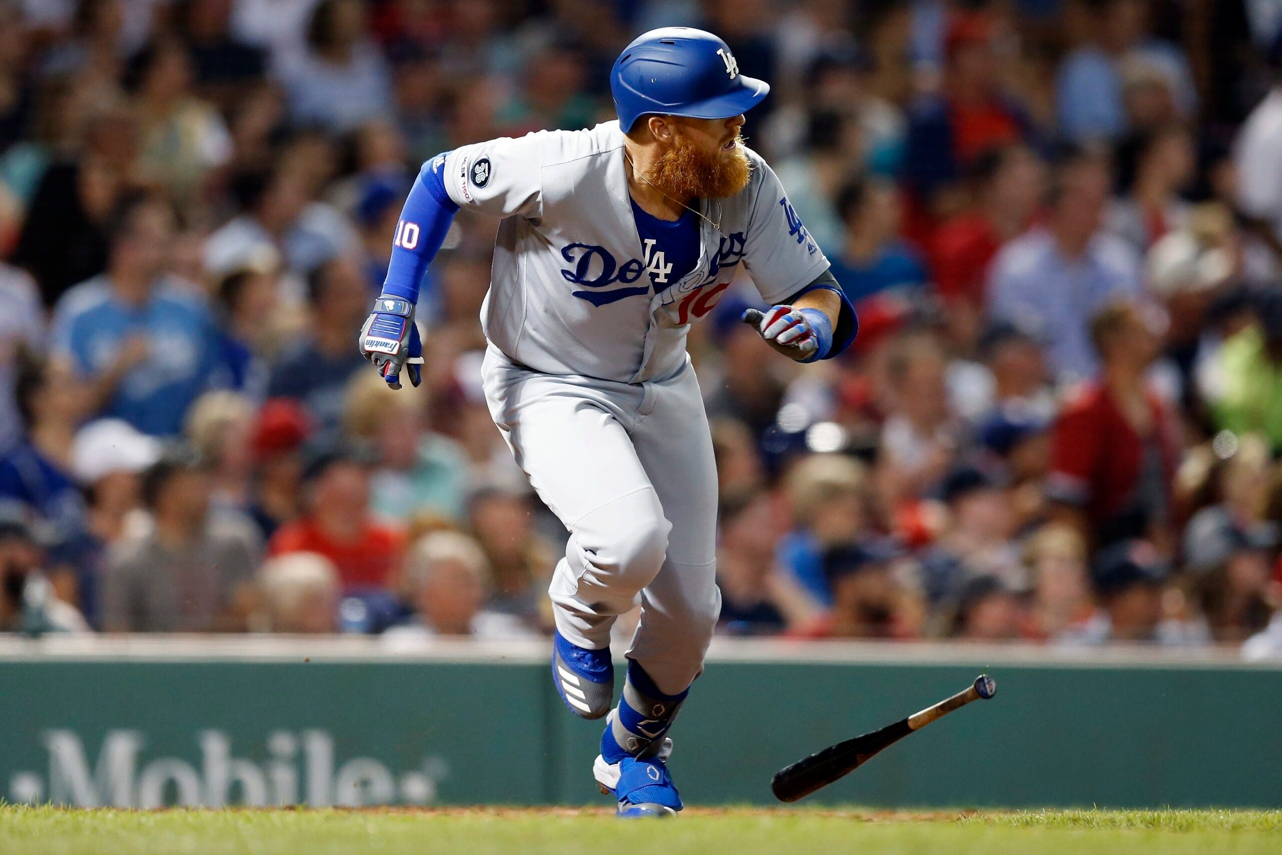 Boston Red Sox Brock Holt tags out Los Angeles Dodgers' Cody