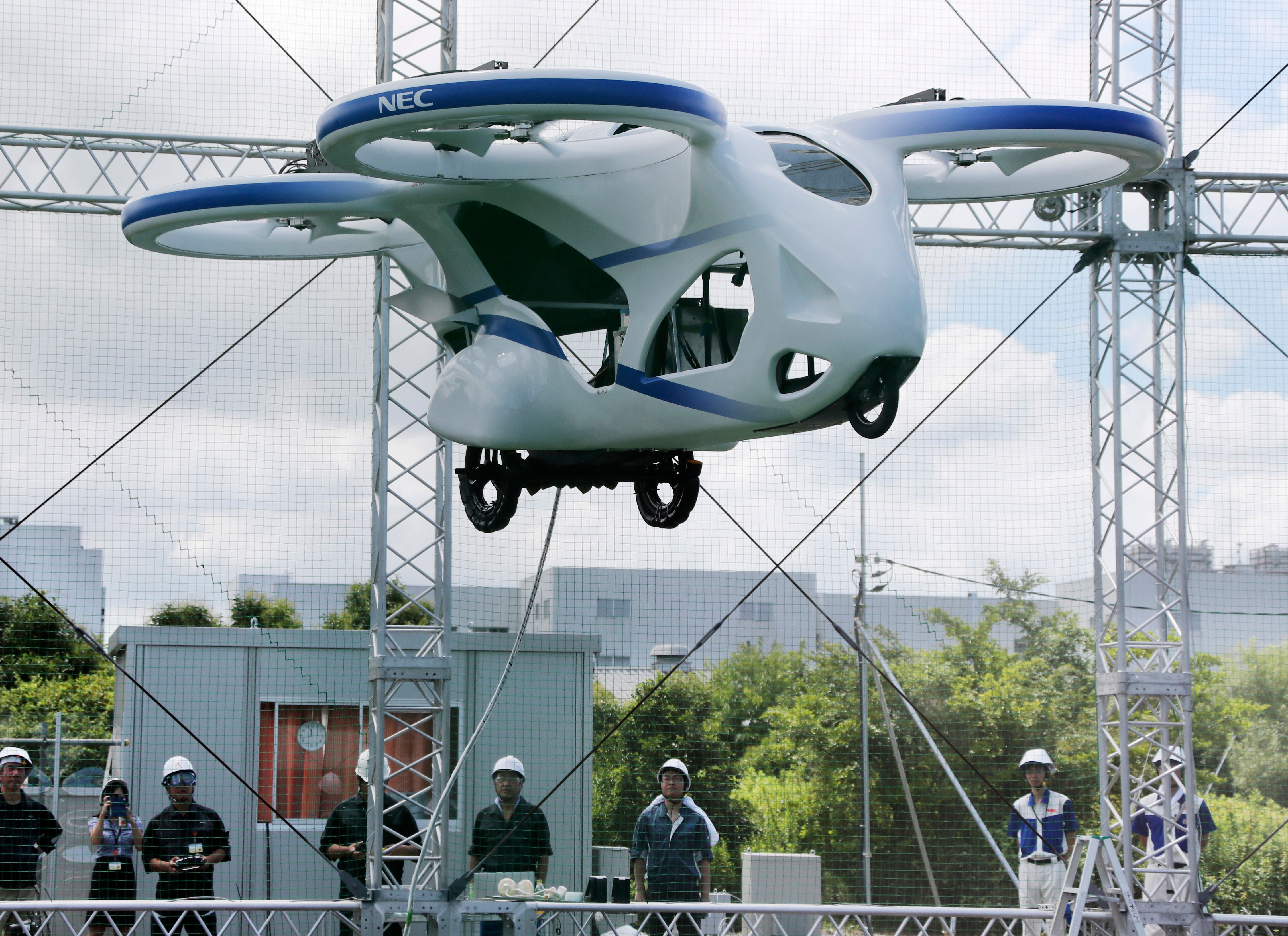 Watch Japan's NEC shows 'flying car' hovering steadily for minute