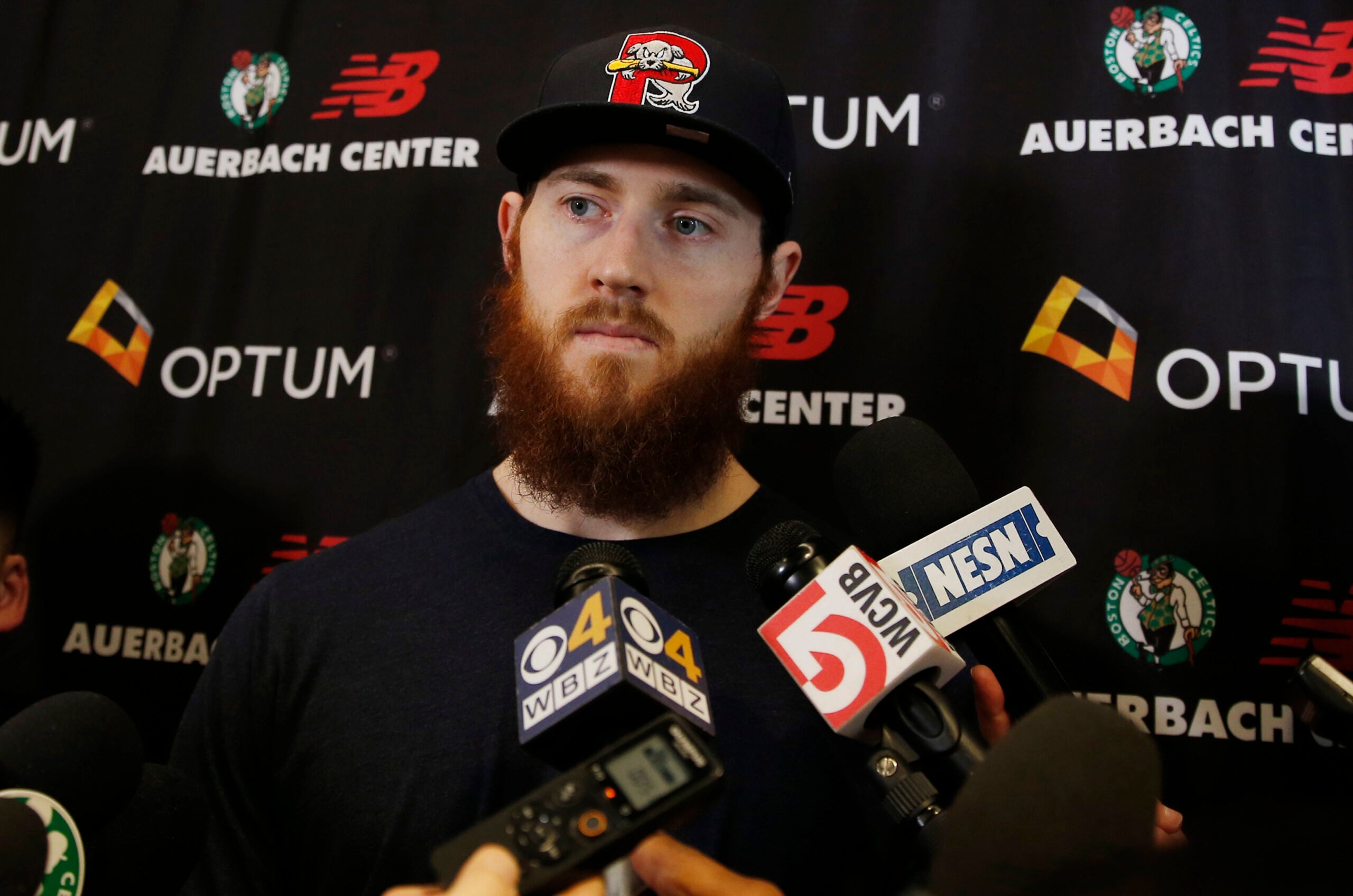Aron Baynes explained his extensive collection of minor league baseball hats
