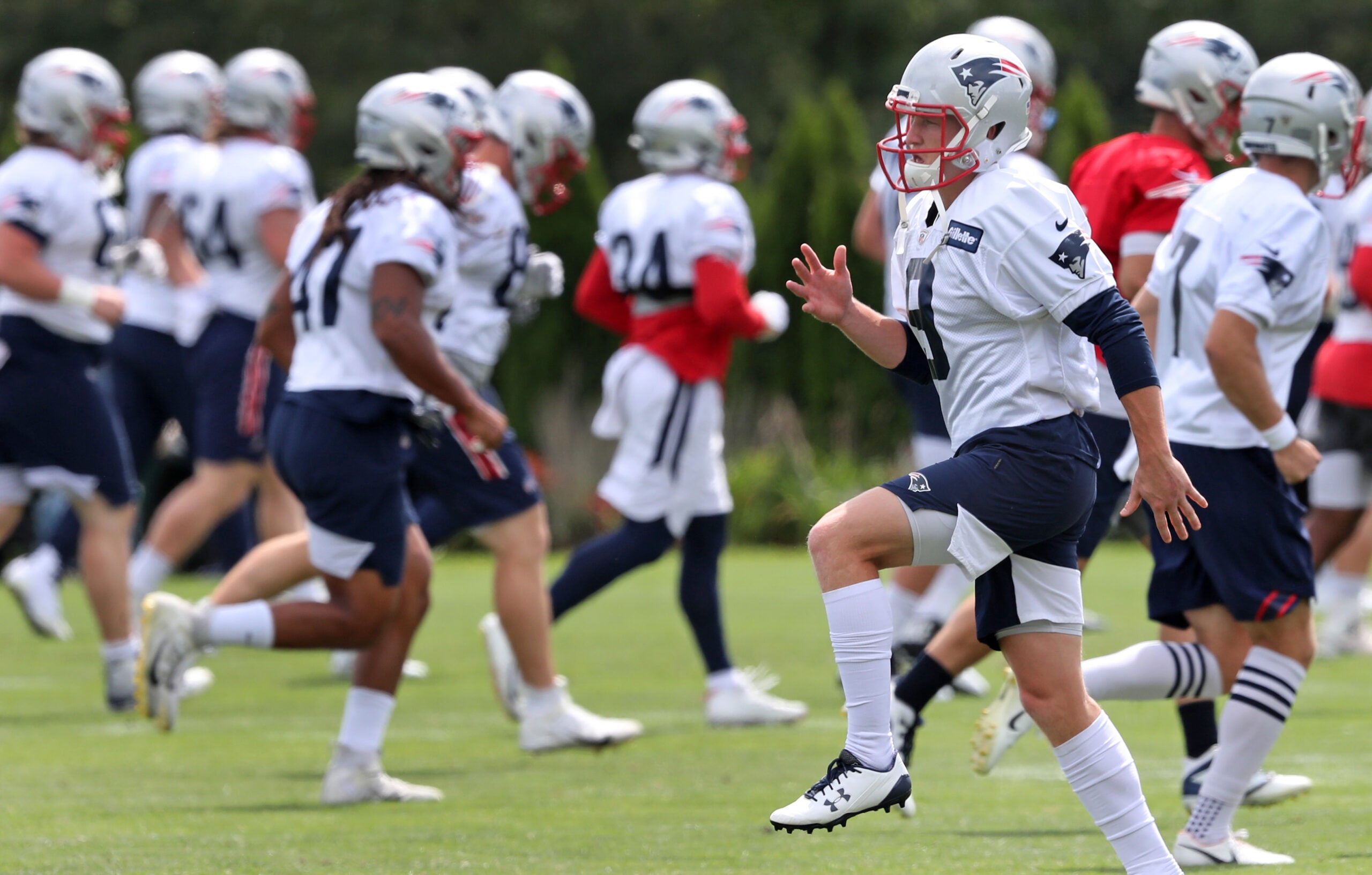 New England Patriots wide receiver Gunner Olszewski (80) warms up