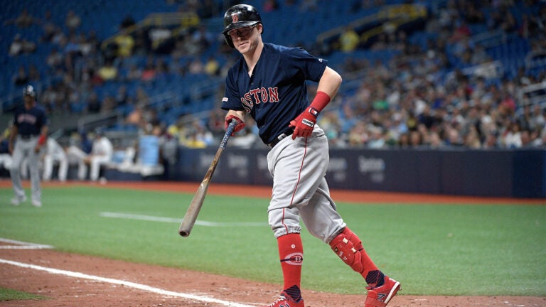 Boston Red Sox second baseman Brock Holt takes a walk during the