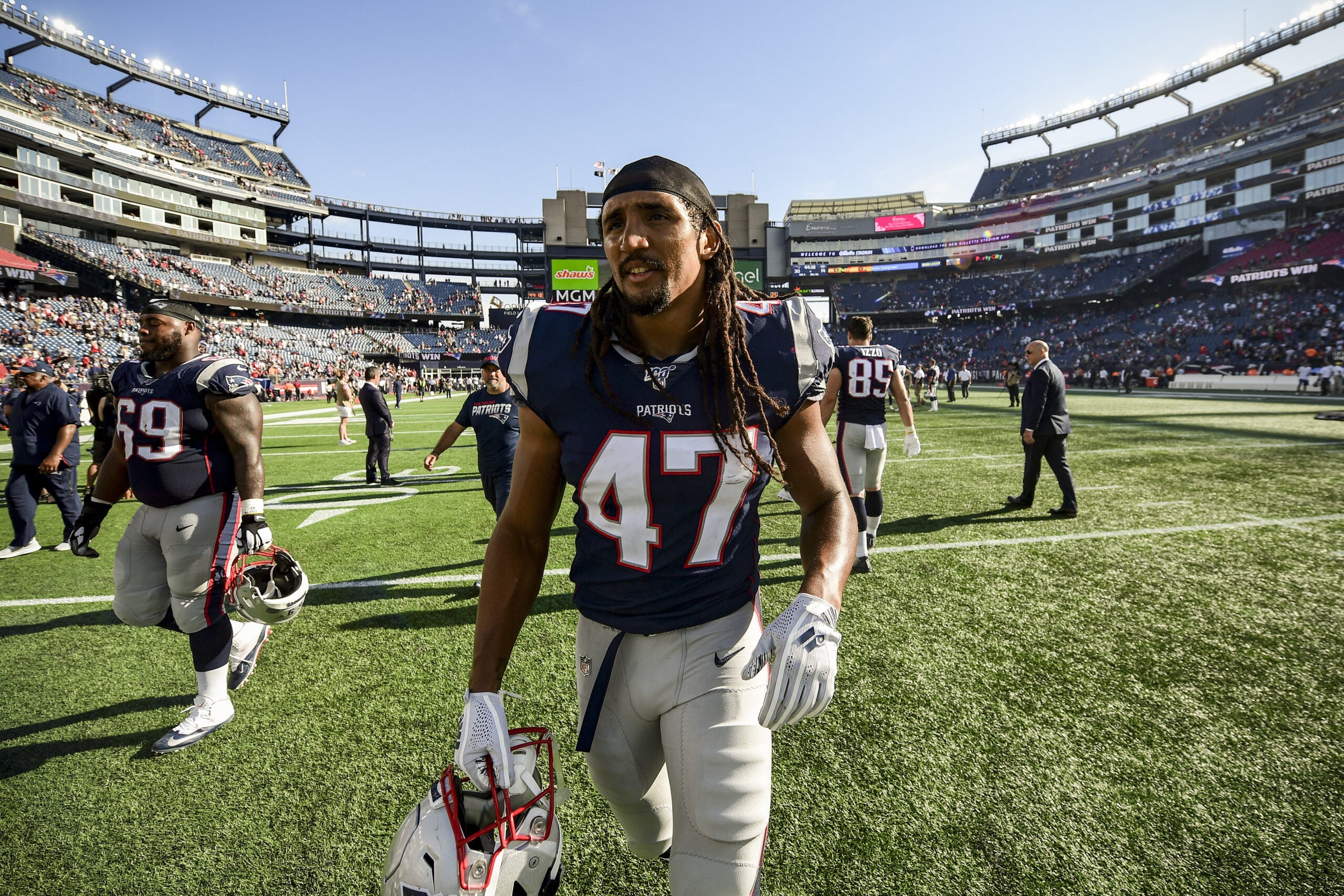 New England Patriots' Jakob Johnson before an NFL football game