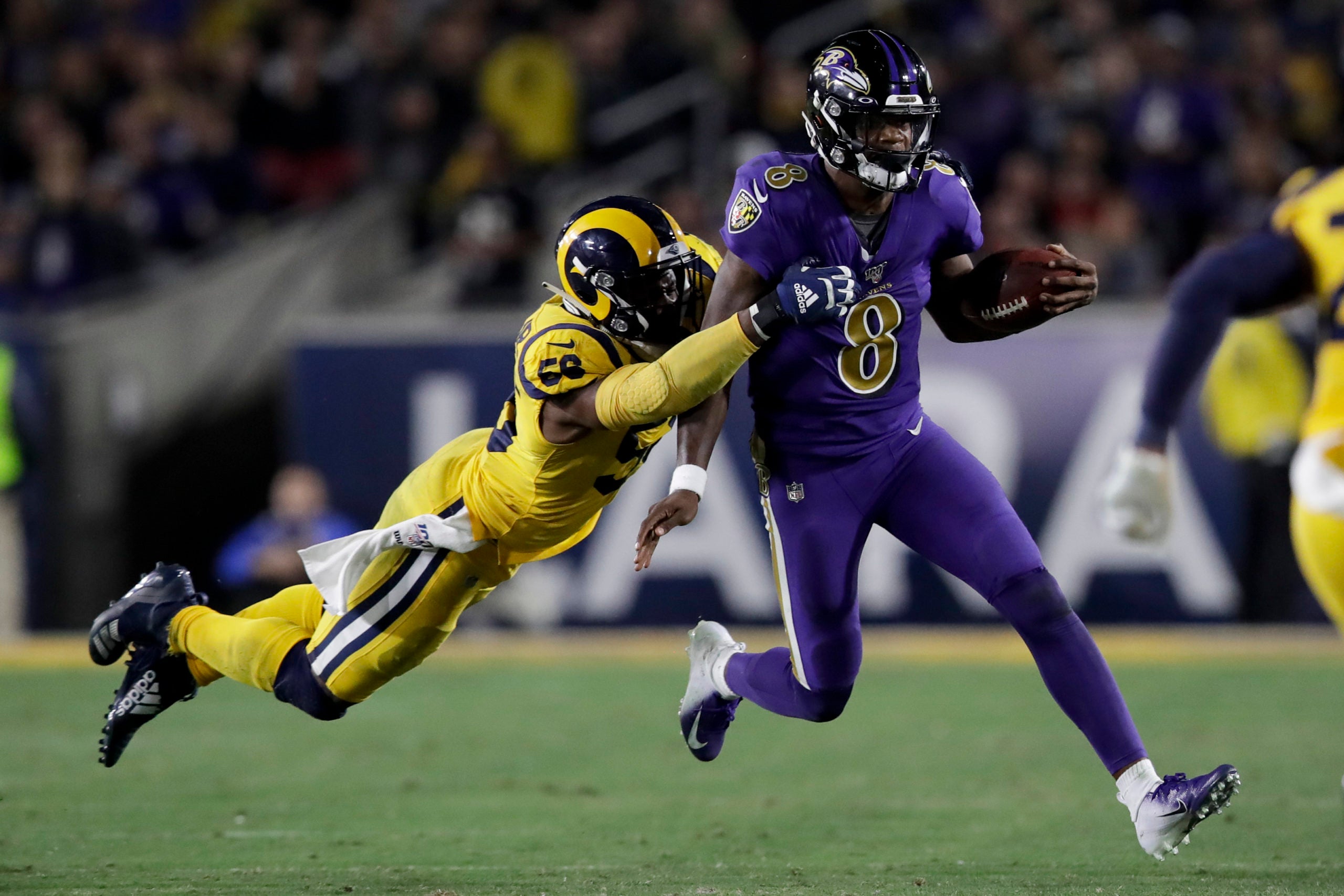 Lamar Jackson Beats Cardinals With Arm And Legs