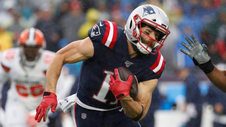 New England Patriots wide receiver Julian Edelman, wearing a Boston Celtics  jersey bearing his number, speaks to the media following an NFL football  game against the Indianapolis Colts, Thursday, Oct. 4,, 2018