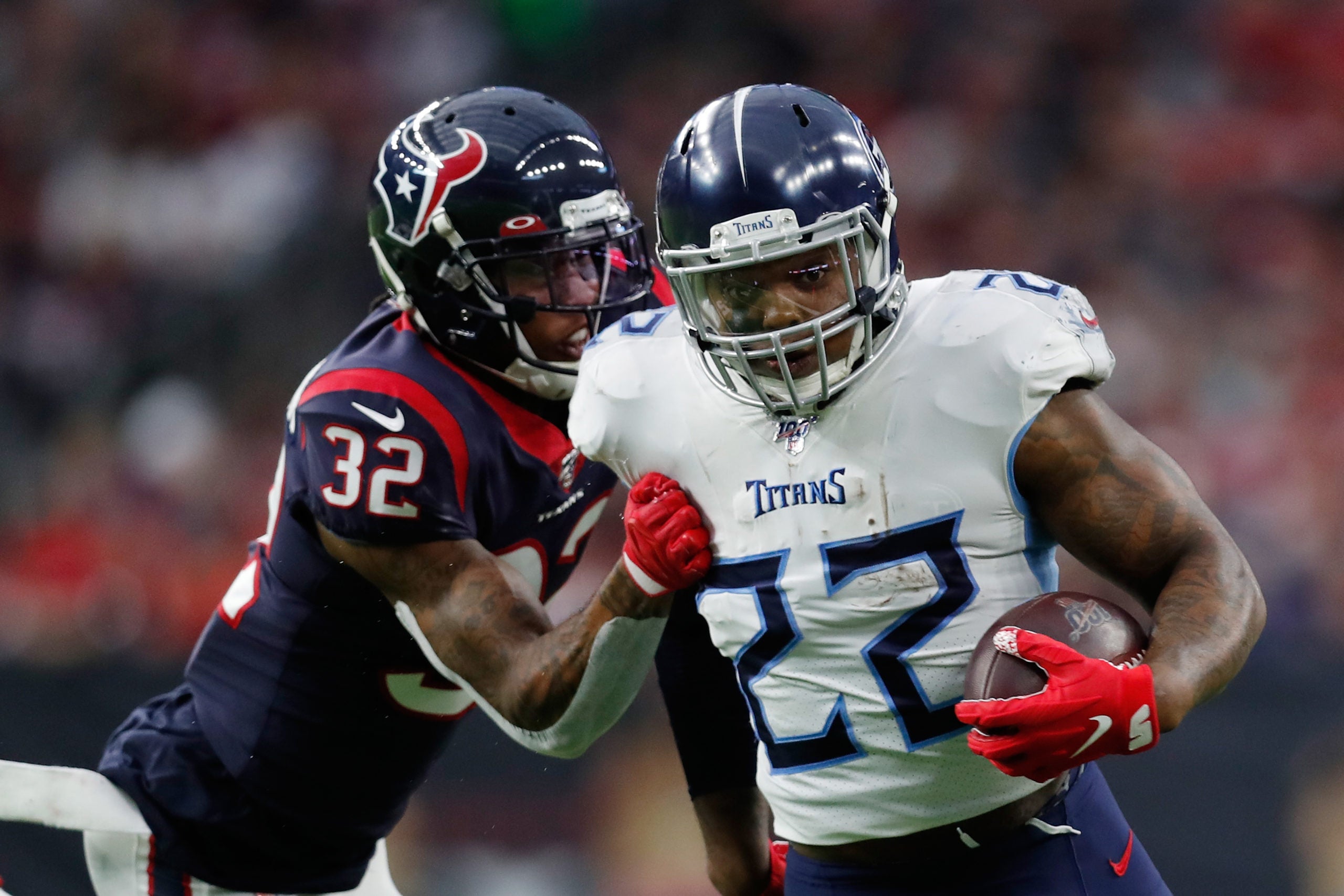 Titans running back Derrick Henry and the crown given to him by a fan