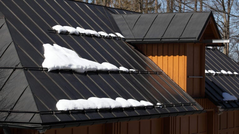 Metal-Roof-Snow-Adobe-Stock