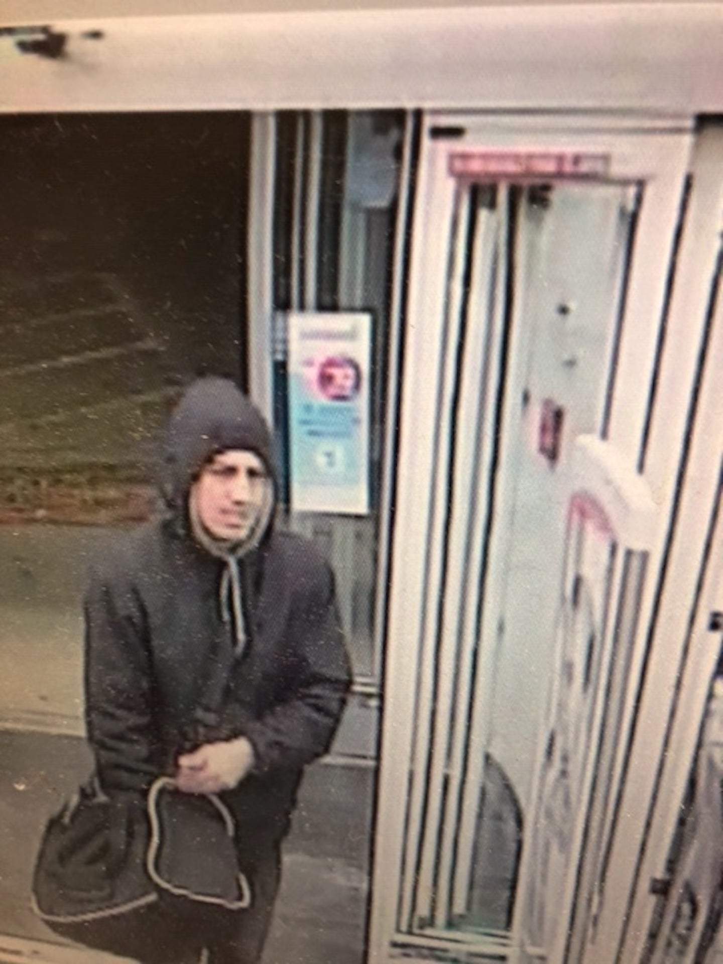 Malden police searching for suspect in pair of armed robberies
