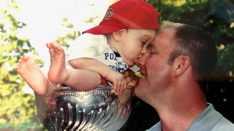 My dad drinking out of the Stanley cup with the Blues coach : r/hockey