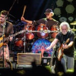 From left, John Mayer, Mickey Hart and Bob Weir perform with Dead & Company at TD Garden in Boston on Nov. 17, 2017.