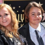 Melissa Etheridge posing with her son Beckett Cypher.