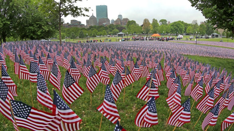 Man, 40, charged after allegedly lighting american flag on fire at boston common, spitting at police
