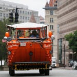 A duck boat arrives on Huntington Avenue.