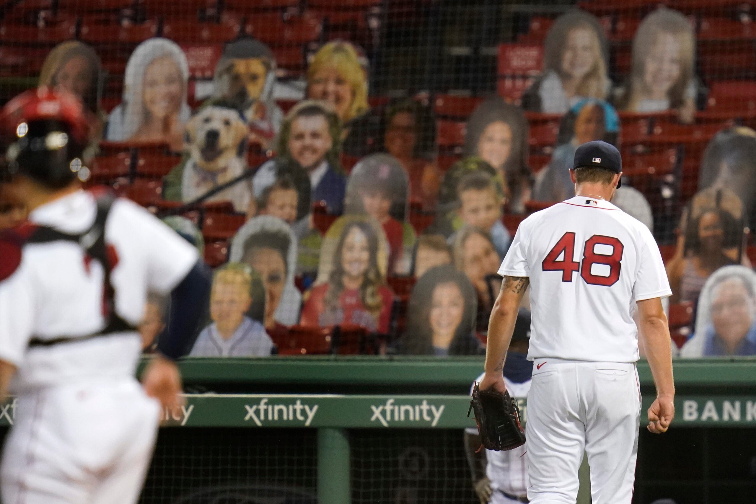 Max Fried and Kevin Pillar of the Atlanta Braves smile during