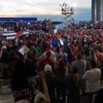 Trump addresses supporters during a campaign rally at Manchester-Boston Regional Airport.