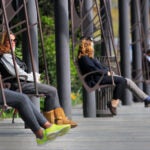 The Rose Kennedy Greenway on the swings.