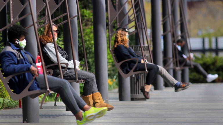 The Rose Kennedy Greenway on the swings.