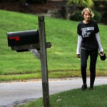 Deb Ternove walks Bailey, a client's dog.