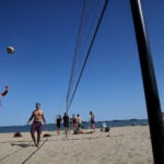 A pickup volleyball game on Carson Beach.