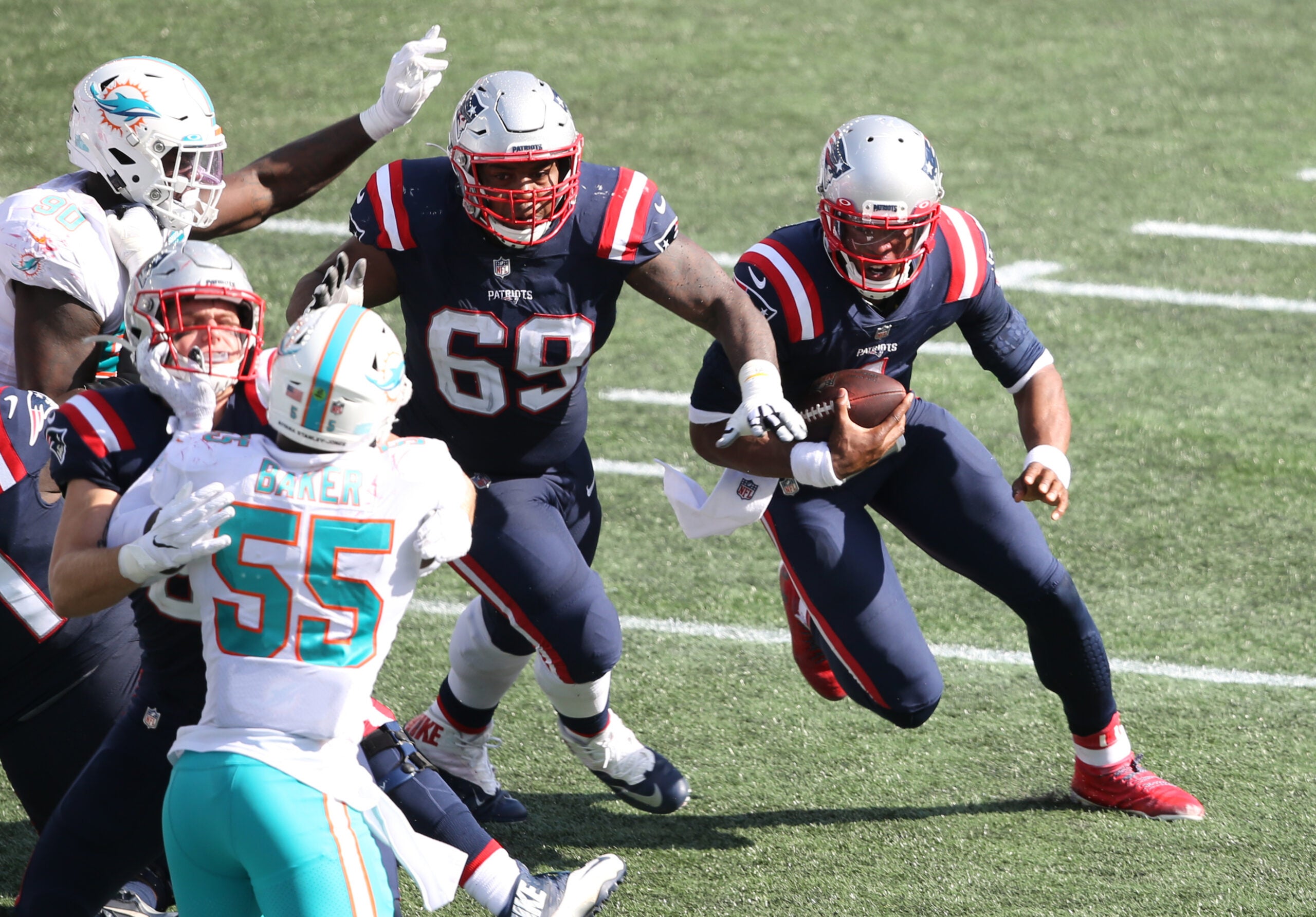 What experts are predicting for Sunday's Patriots-Dolphins game