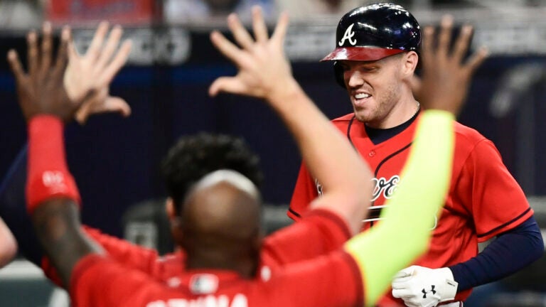 Atlanta Braves first baseman Freddie Freeman sits in the dugout