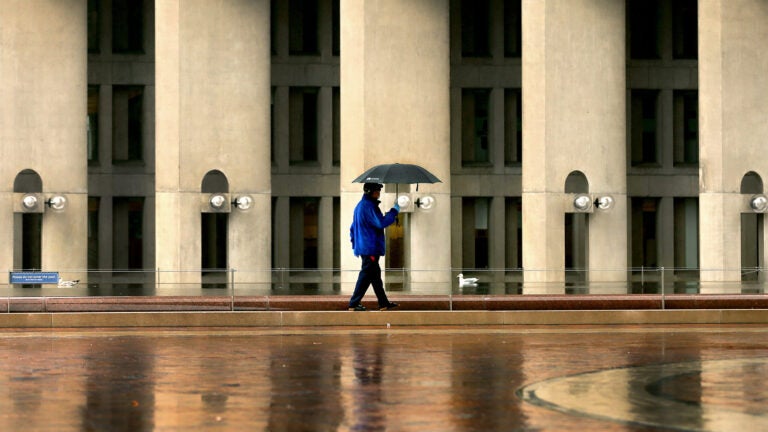 The Christian Science Center plaza during heavy rain.