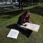 "BU Beach," the green space behind Marsh Chapel overlooking Storrow Drive and the Charles River.