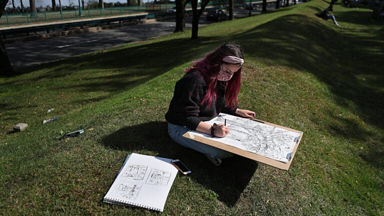 "BU Beach," the green space behind Marsh Chapel overlooking Storrow Drive and the Charles River.