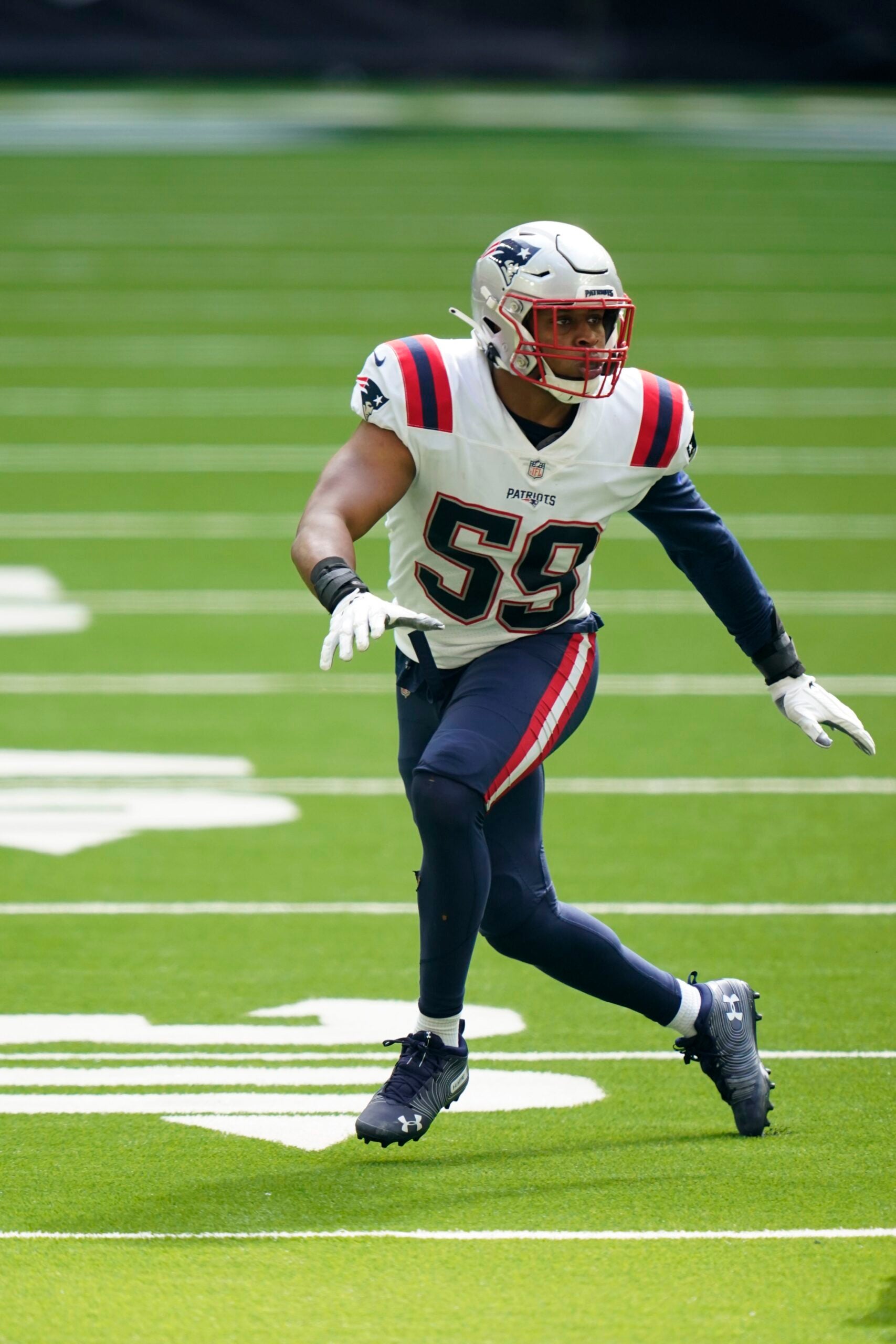 New England Patriots linebacker Anfernee Jennings (58) defends during the  second half of an NFL football game against the Chicago Bears, Monday, Oct.  24, 2022, in Foxborough, Mass. (AP Photo/Stew Milne Stock