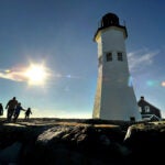 A brilliant afternoon sun lights up the Scituate Lighthouse.