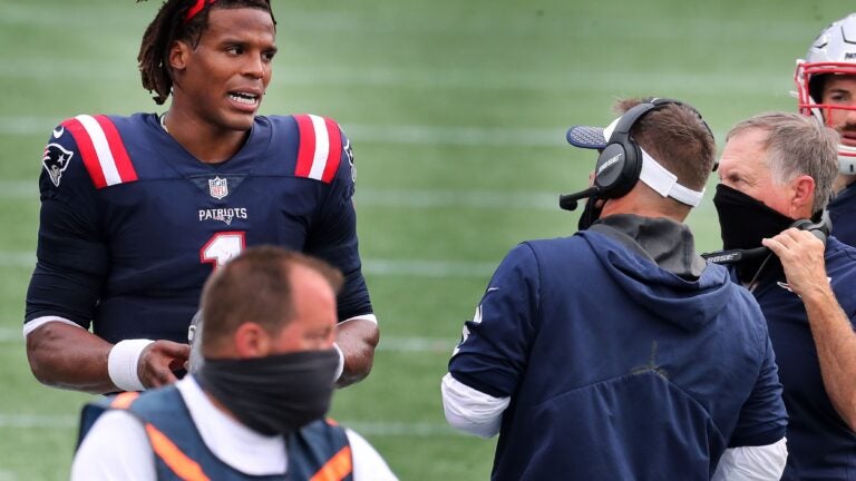 Tom Brady and Mac Jones pose side-by-side in Devin McCourty photo