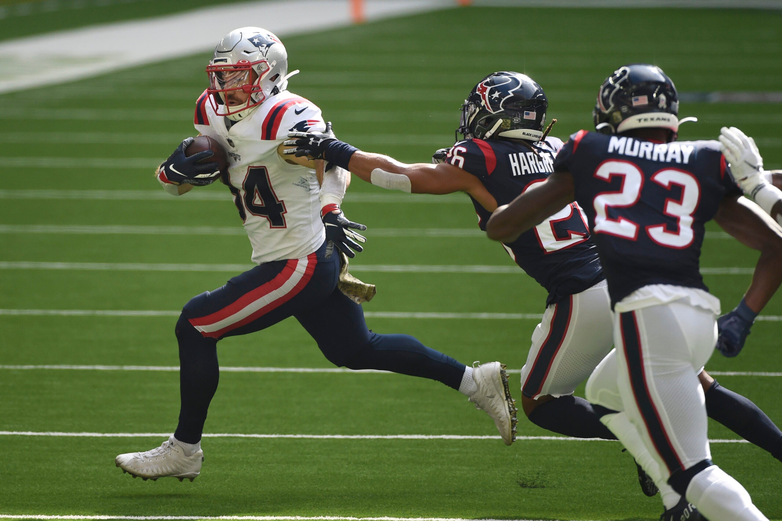 Patriots RB Rex Burkhead knocked out of Texans game with knee