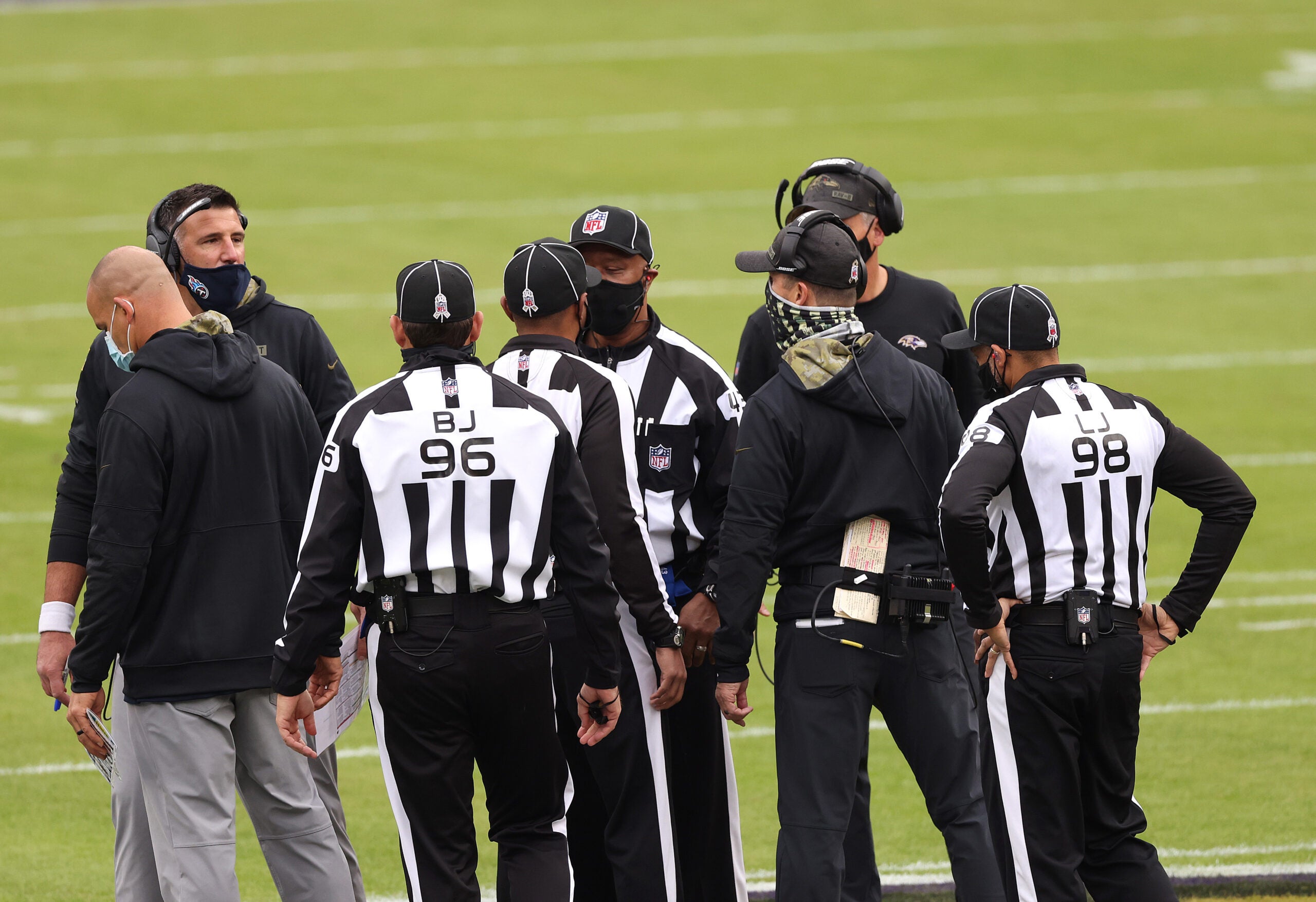 Tennessee Titans coach Mike Vrabel walks out of Friday's press conference