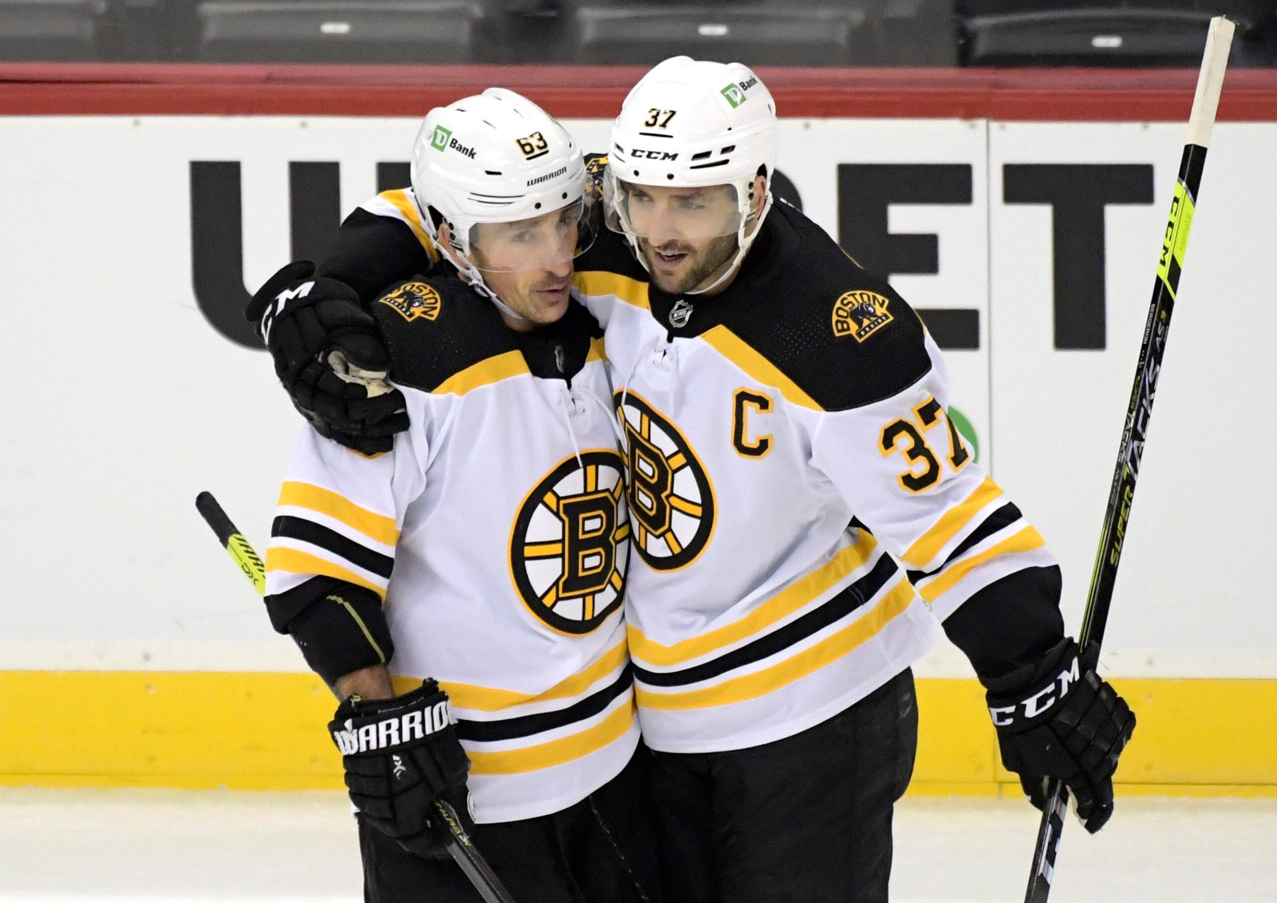 Brad Marchand & Patrice Bergeron Hug During Bergeron's Final Game Boston  Bruins Photo