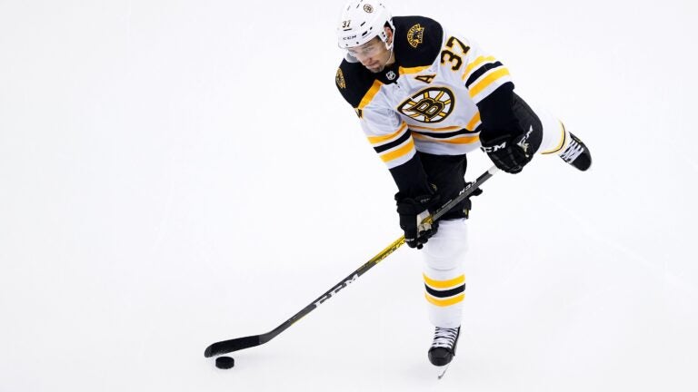 Bruins name Brad Marchand captain, succeeding Patrice Bergeron - ESPN