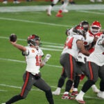 Tom Brady passes in the first quarter of Super Bowl LV.