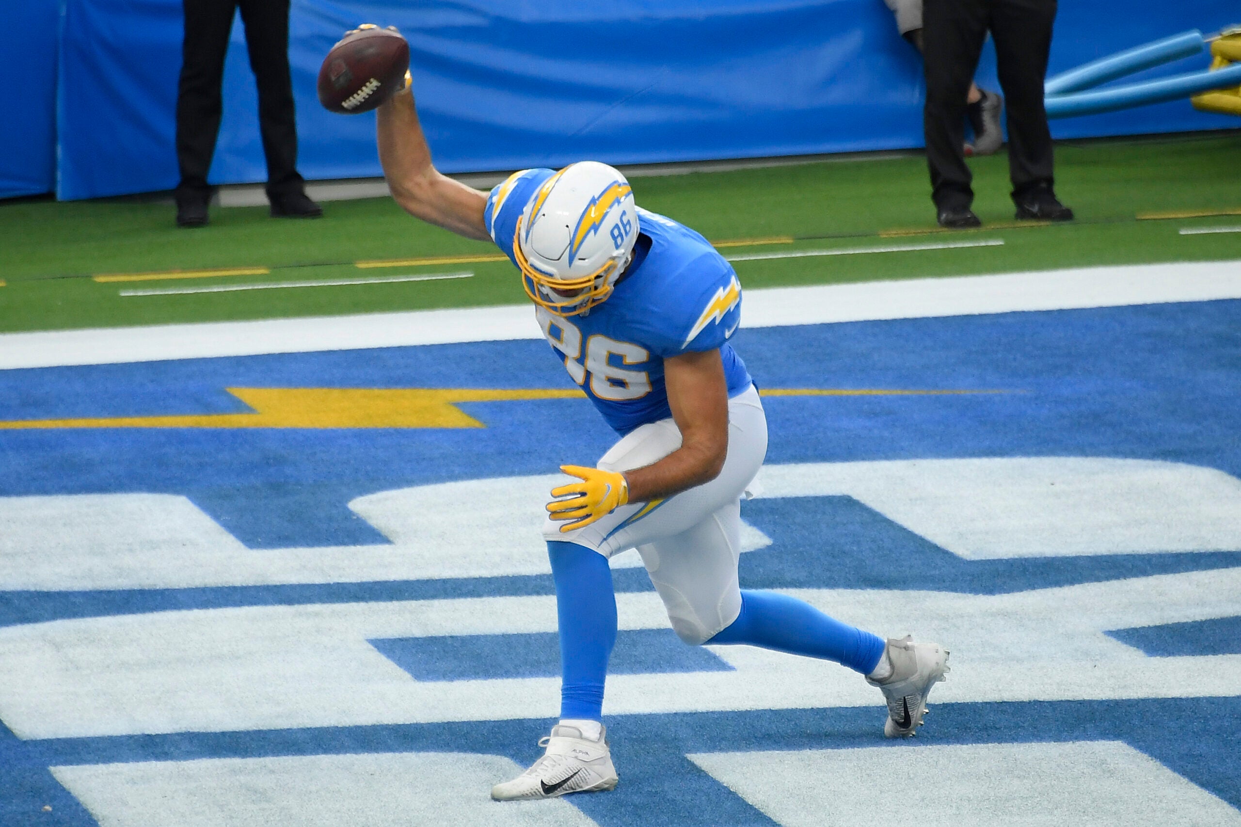 Los Angeles Chargers' Hunter Henry, right, makes a catch as