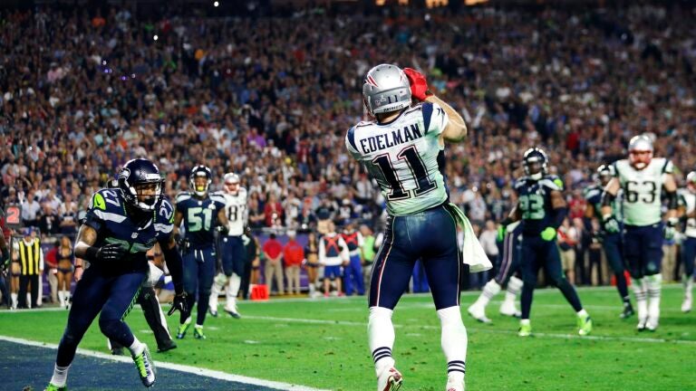 October 18, 2015: New England Patriots wide receiver Julian Edelman (11)  runs with the ball during NFL football game action between the New England  Patriots and the Indianapolis Colts at Lucas Oil