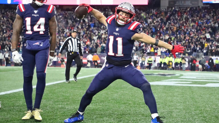 New York Giants cornerback Julian Love (37) tackles New England Patriots  wide receiver Julian Edelman in the first half of an NFL preseason football  game, Thursday, Aug. 29, 2019, in Foxborough, Mass. (