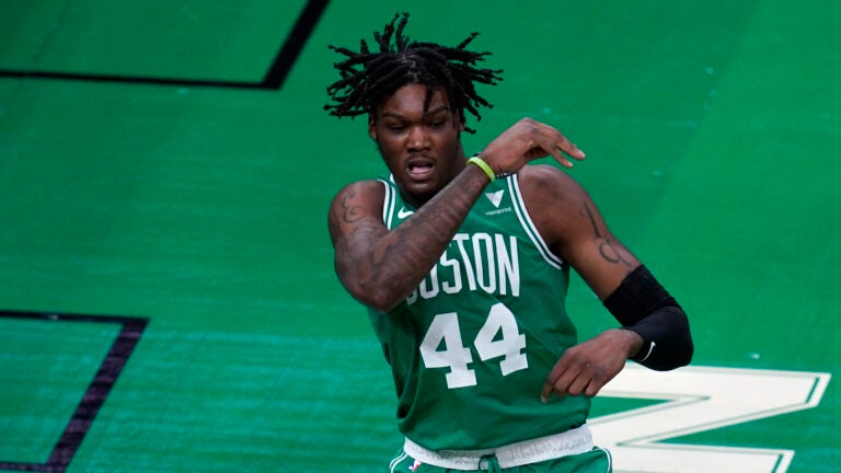 Robert williams in walking boot after suffering an ankle sprain in game 3