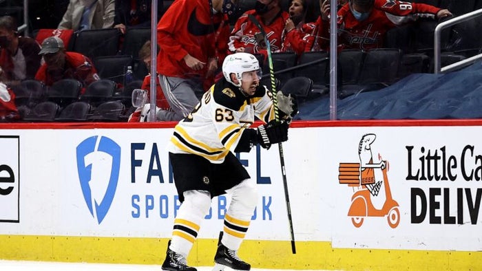 Watch: Brad Marchand's overtime goal wins it for Bruins, ties series