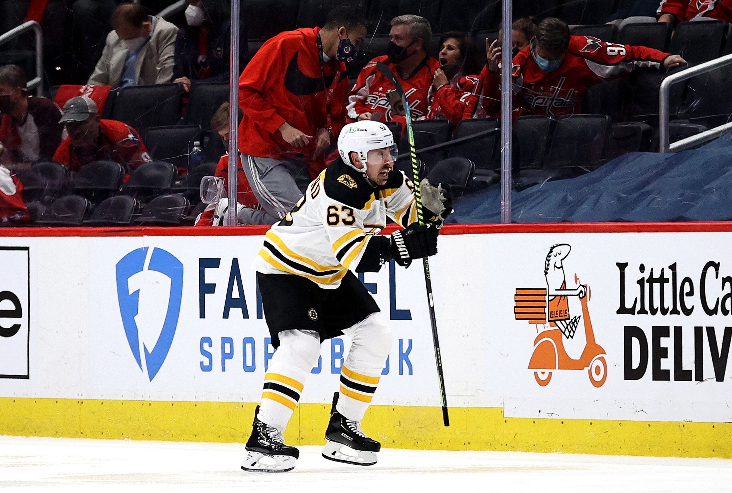 Matthew Poitras, Mason Lohrei survive latest Bruins roster cuts