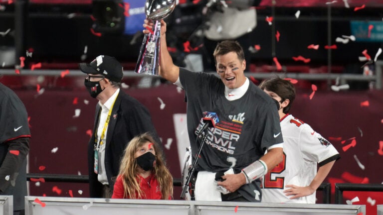Tom Brady Chugs Beer, Shows Off Super Bowl Rings at Ceremony